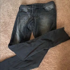 Black distressed skinny jeans